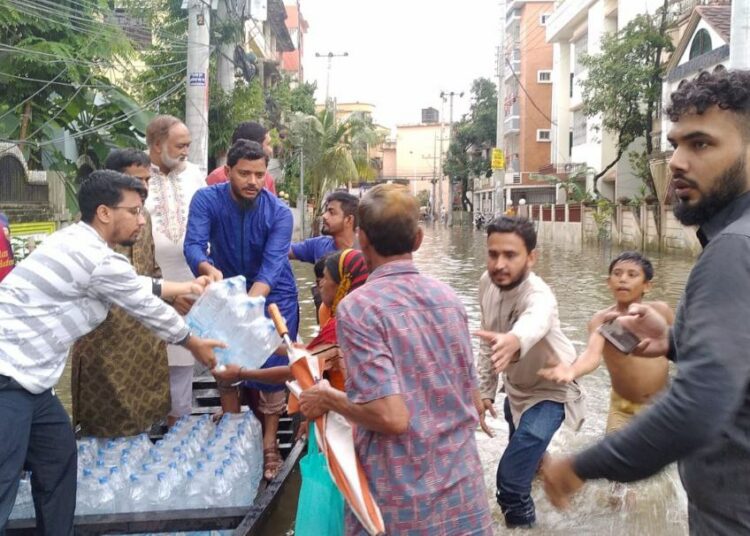 Jamaat Dhaka City South distributed 10,000 packets of relief goods to flood victims in Sylhet
